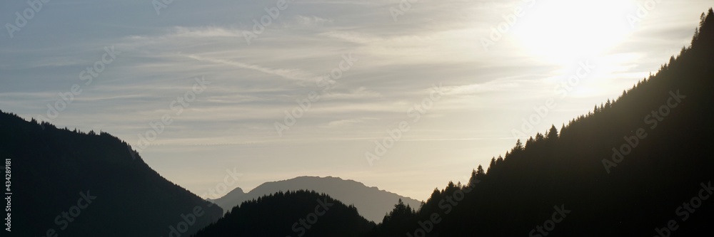 Panoramic View Of Mountains Against Sunset Panoramic View Of Mountains Against Sunset