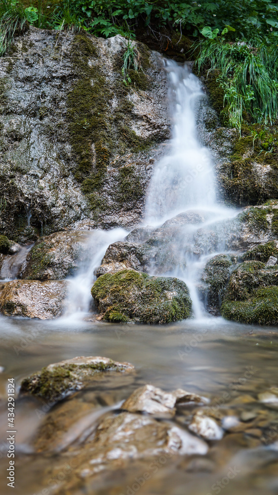 Fototapeta premium Small waterfall, river, National Park, Alps, Europe