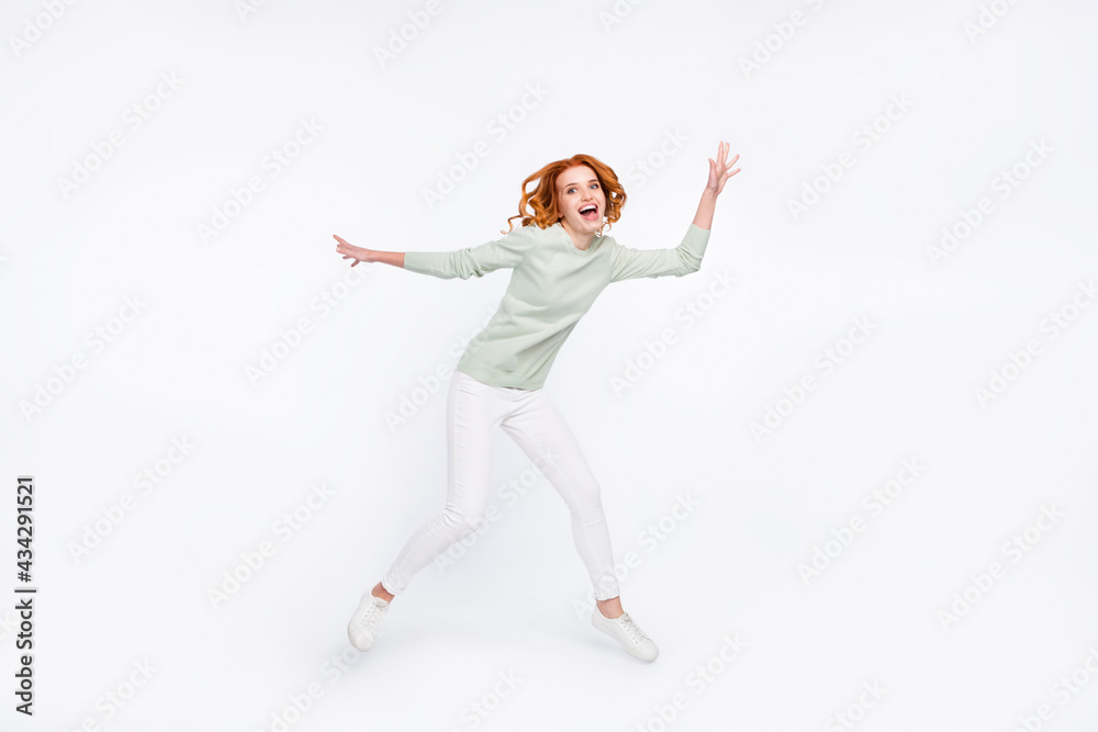 Full length body size photo young woman red hair playing fooling like child isolated white color background Full length body size photo young woman red hair playing fooling like child isolated white color background