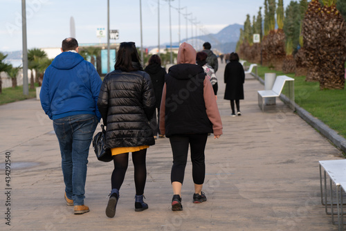 Batumi, Georgia - May 12, 2021: People stroll along the embankment