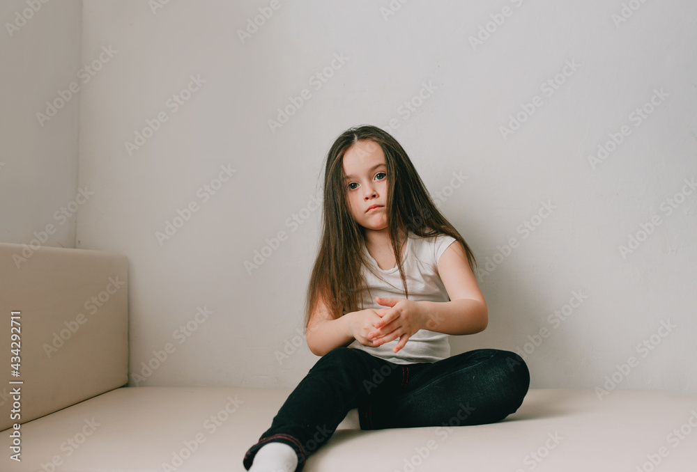 large portrait of a little girl showing her tongue. large portrait of a little girl showing her tongue.
