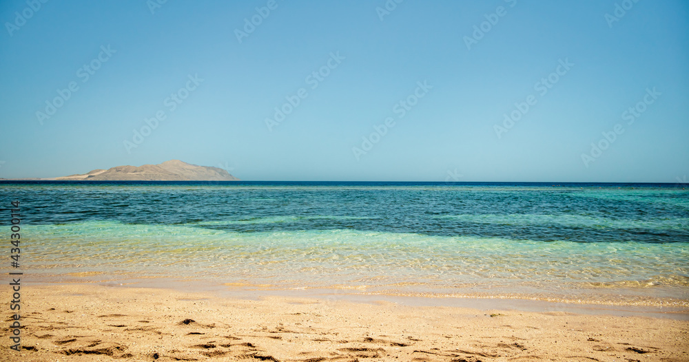 beach and sea with reefs in Egypt 