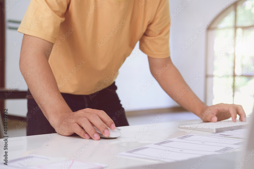 Web designer planning application for mobile phone. Design application development draft sketch drawing online Technology Content.User experience concept.