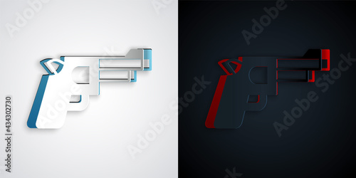 Paper cut Pistol or gun icon isolated on grey and black background. Police or military handgun. Small firearm. Paper art style. Vector