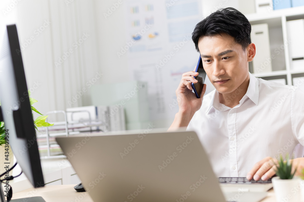 Fototapeta premium asian man speak on smartphone