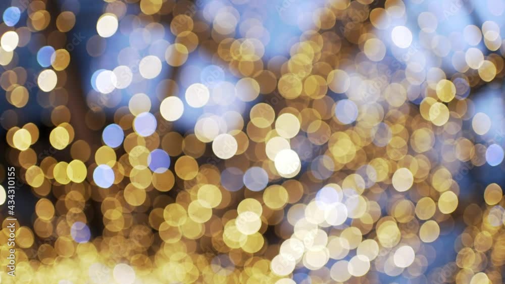 Light defocused. Glowing ilumination. Decorative golden round lights Light defocused. Glowing ilumination. Decorative golden round lights