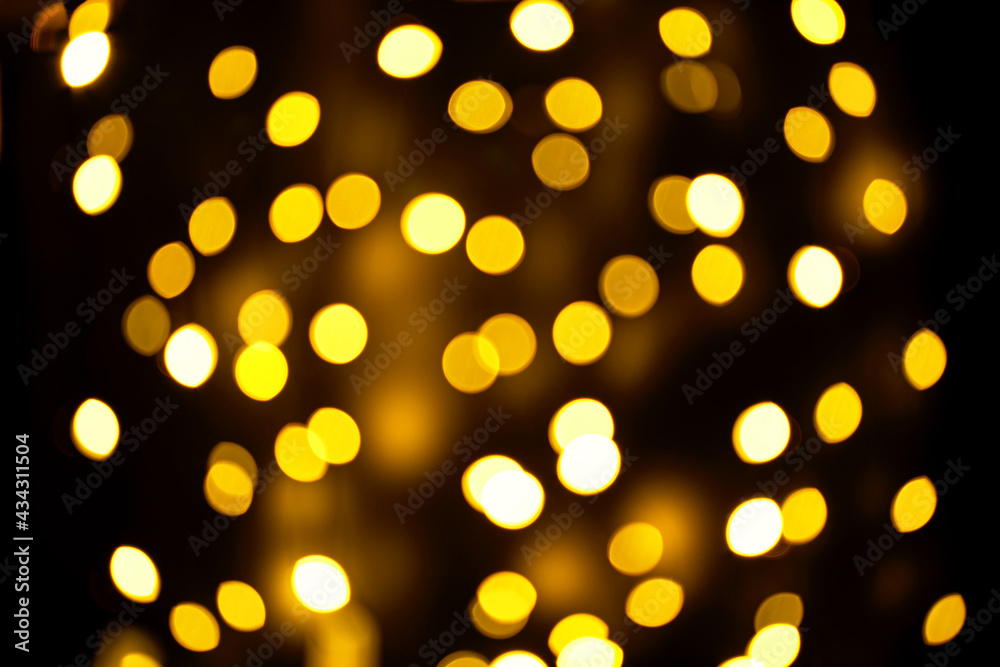 Abstract festive elegant background of blurred with bokeh lights on brown background, defocused Abstract festive elegant background of blurred with bokeh lights on brown background, defocused