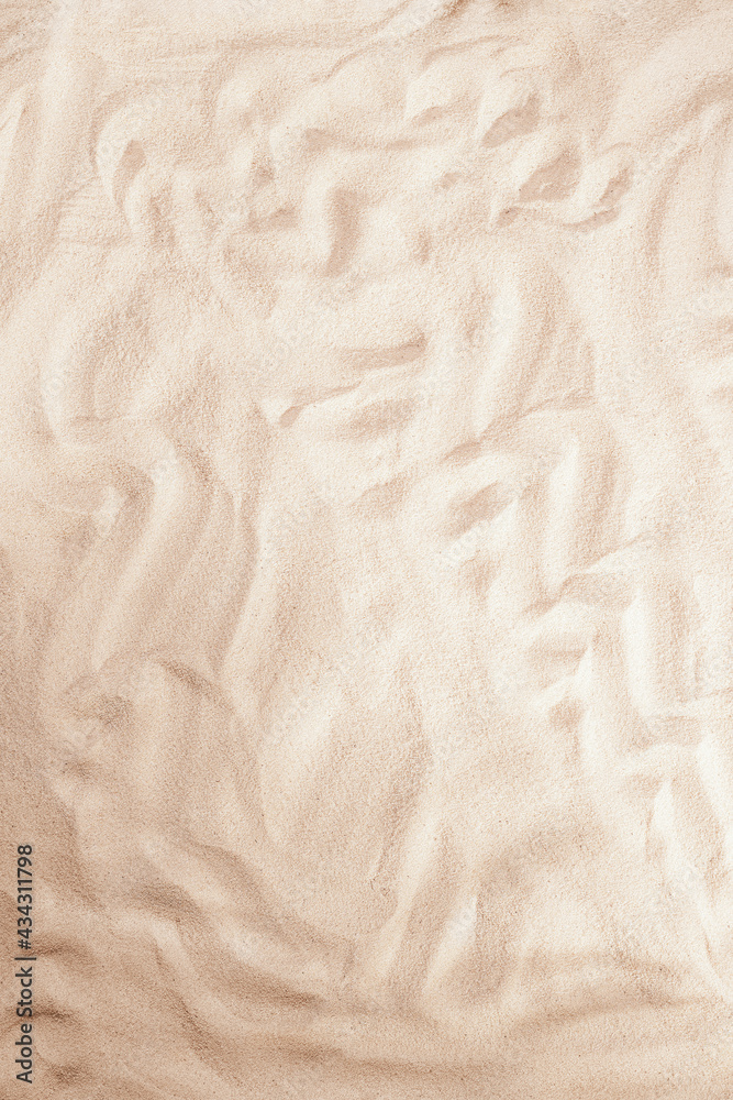 Sand background with copy space for text. Sand texture waves closeup. Vertical background pattern of sand beach Sand background with copy space for text. Sand texture waves closeup. Vertical background pattern of sand beach
