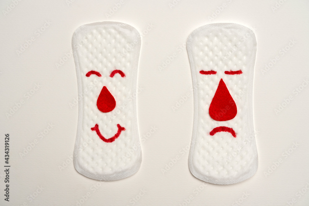 Pair of menstrual pads with faces, isolated on white background. Pair of menstrual pads with faces, isolated on white background.