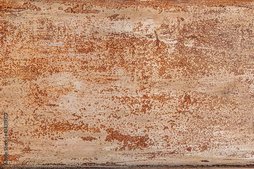 Rusty shabby metal background with old scratches on gray paint.