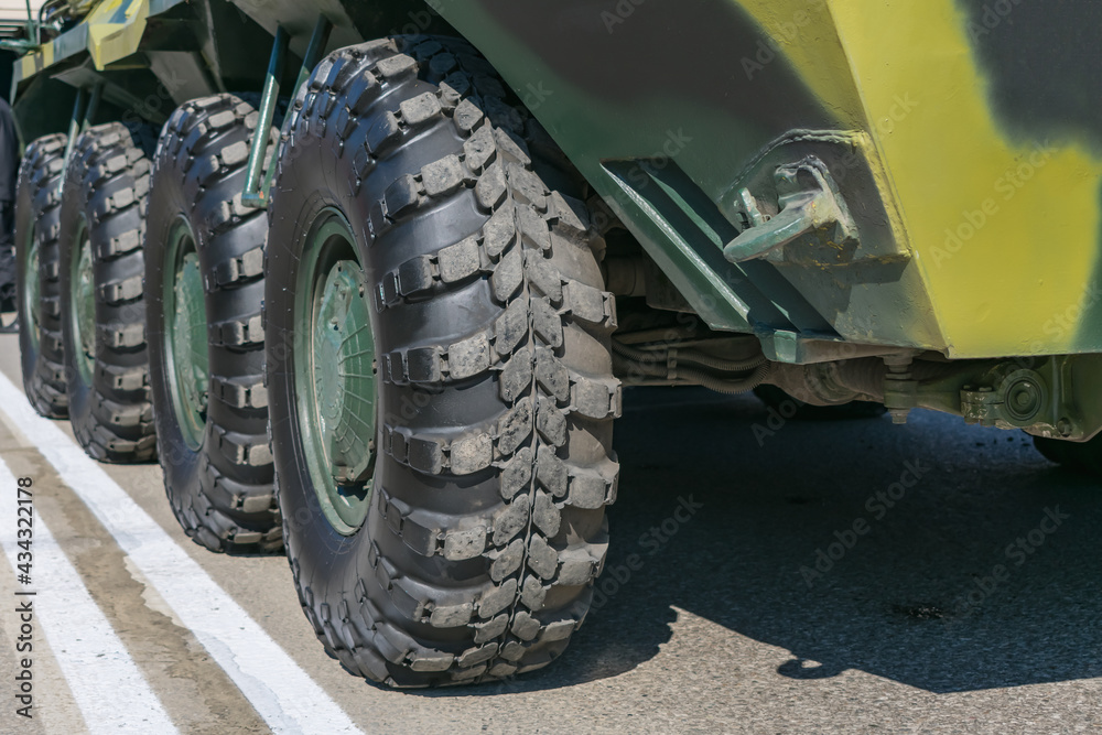 Wheels of armored vehicles close-up while parked