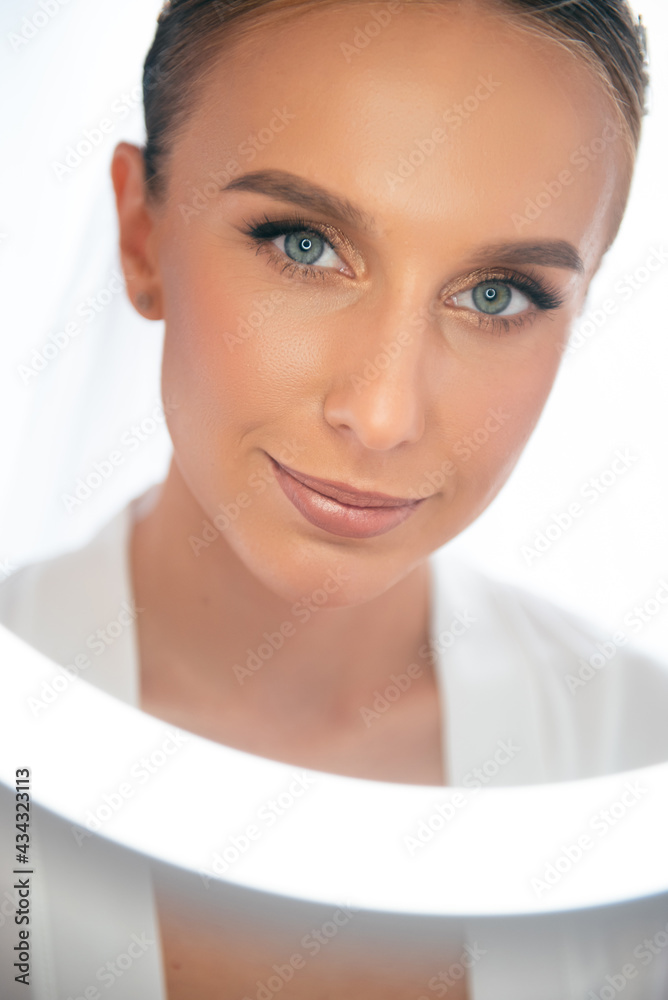 Portrait of stunning bride with wedding makeup and hairstyle Portrait of stunning bride with wedding makeup and hairstyle