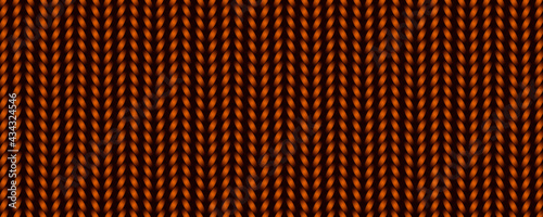 abstract vertical braided stripes. pigtail pattern. yellow-brown knitted texture. face loops. horizontal cover. site header. the concept of needlework and hobbies.