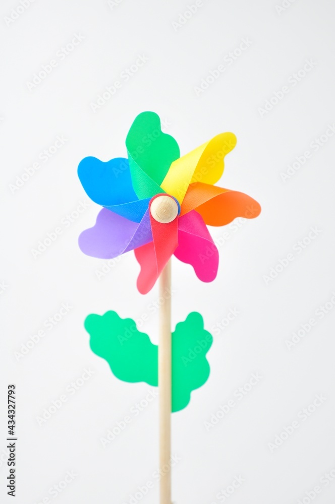 Colorful small windmill on a white background Colorful small windmill on a white background