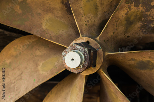 Ship's bronze propeller, close-up. Ship propeller blades.