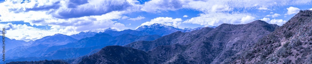 Panoramic Andes mountains in Chile in a beautiful blue color