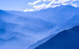 Condor in Andes mountains in Chile in a beautiful blue color