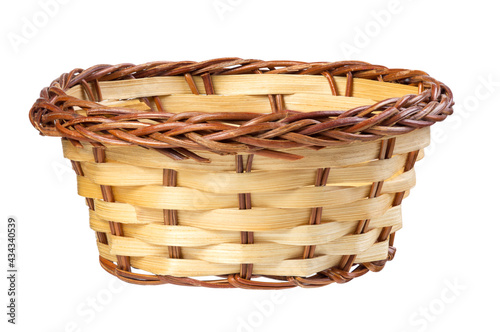 Empty wicker basket isolated on white