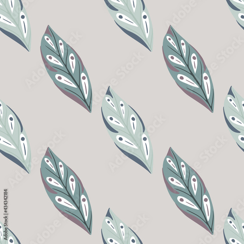Pale tones seamless pattern with decorative abstract leaves elements print. Grey background. Doodle ornament.
