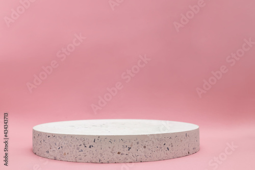 Concrete podium on pink background for product presentation