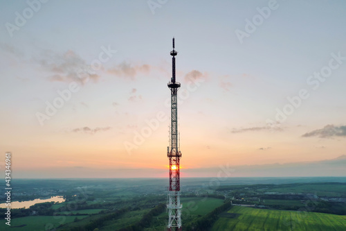 Telecommunication tower of 4G and 5G cellular. Base Station or Base Transceiver Station. Wireless Communication Antenna Transmitter. Telecommunication tower with antennas against sunset.
