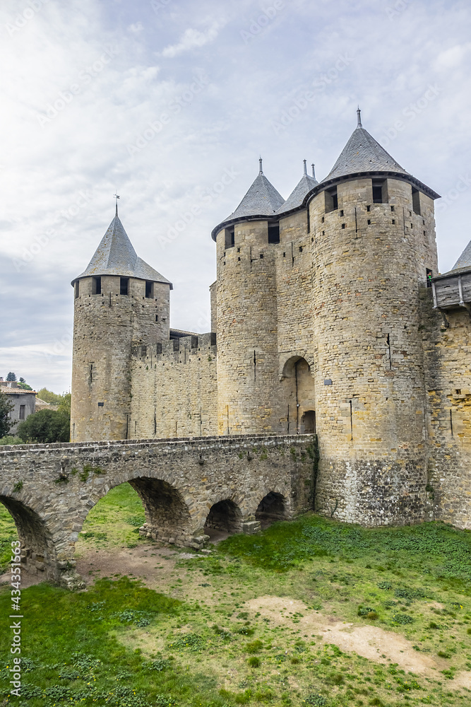 Entrance to Chateau Comtal in the walled and turreted fortress of Carcassonne La Cite. Carcassonne, Languedoc, region of Occitanie, France.