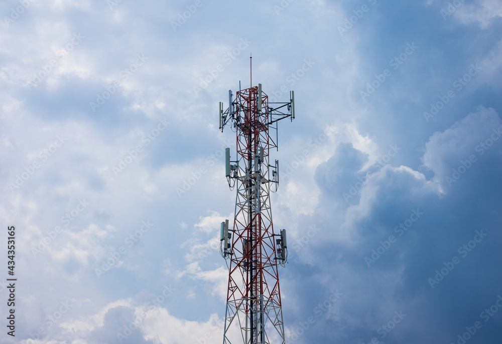 Telecommunication tower on blue sky background with clouds. Telecommunication tower on blue sky background with clouds.