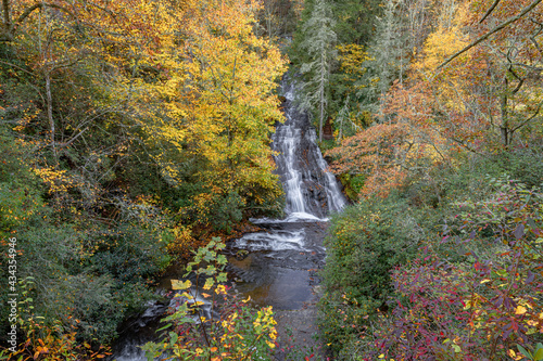 Beautiful autumn landscape shot of Connestee Falls and Carson Creek