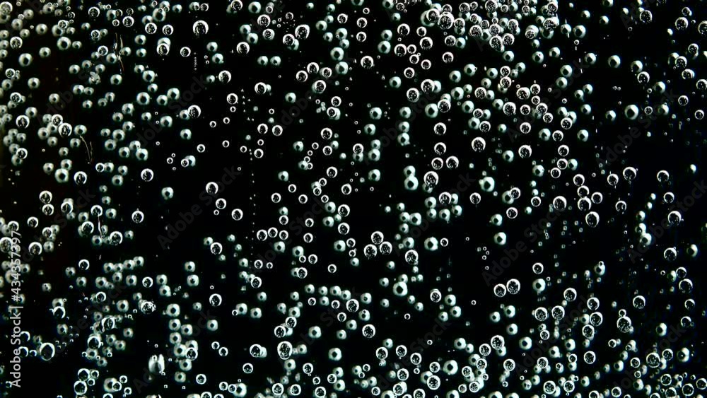 Air bubbles of the fizzy water. Air bubbles of the fizzy water.