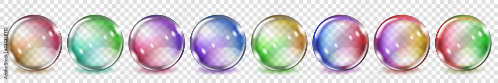 Naklejka premium Set of translucent colored spheres with glares and shadows on transparent background. Transparency only in vector format