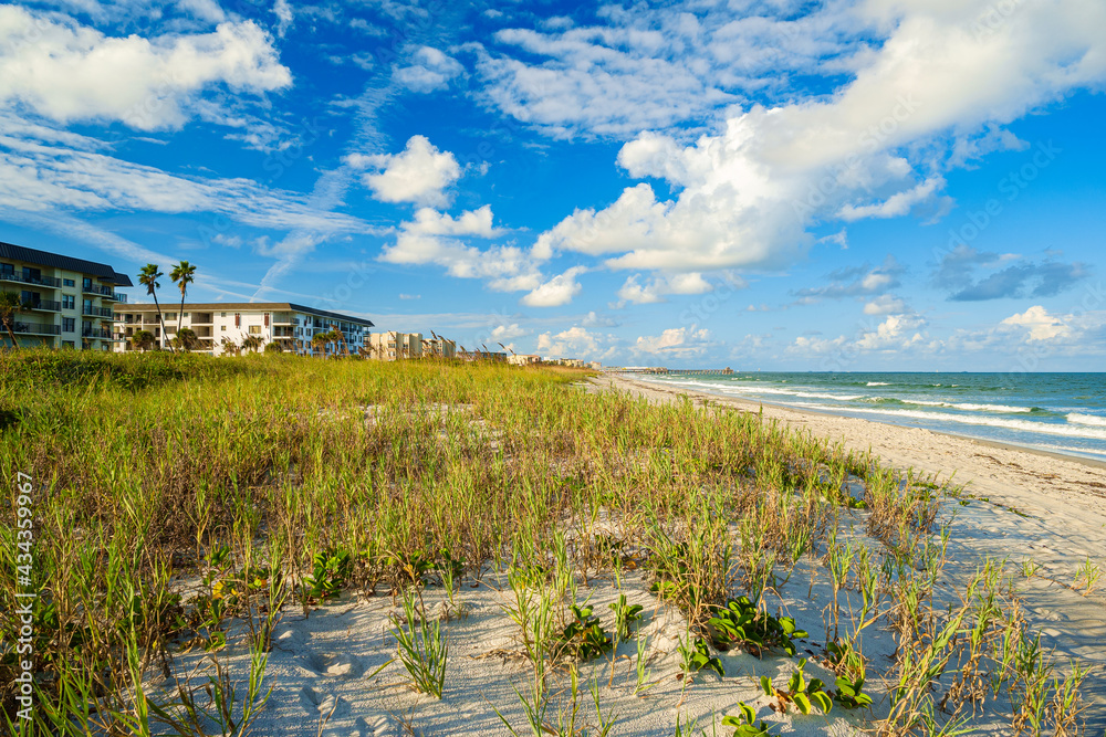 Beautiful Cocoa Beach, Florida with blue sky and clouds