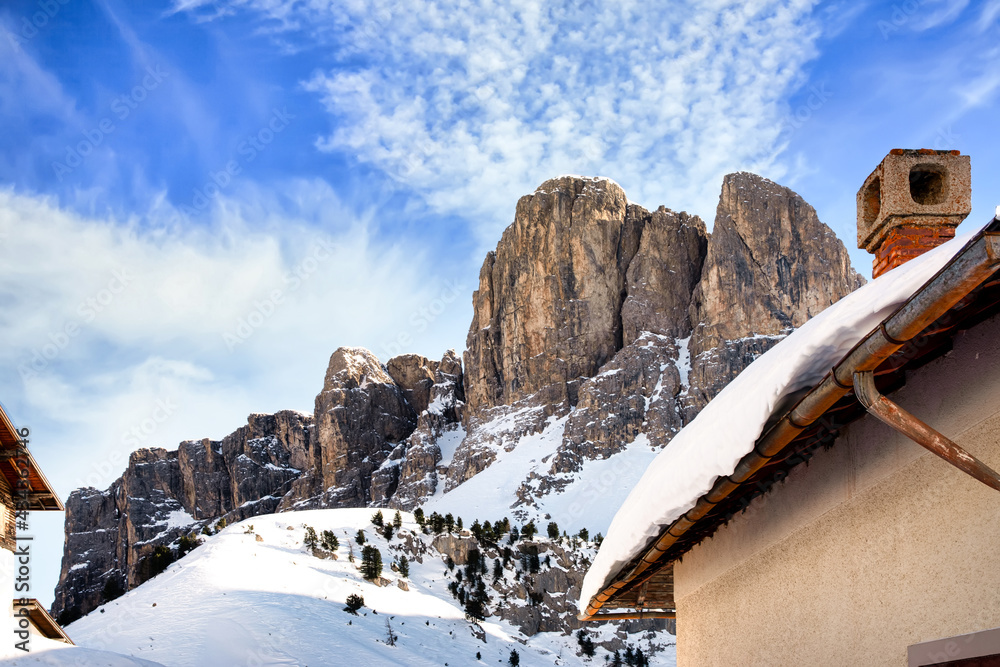 Wolkenstein in Gröden in winter with view to the pizes de cir, Dolomite, Italy
