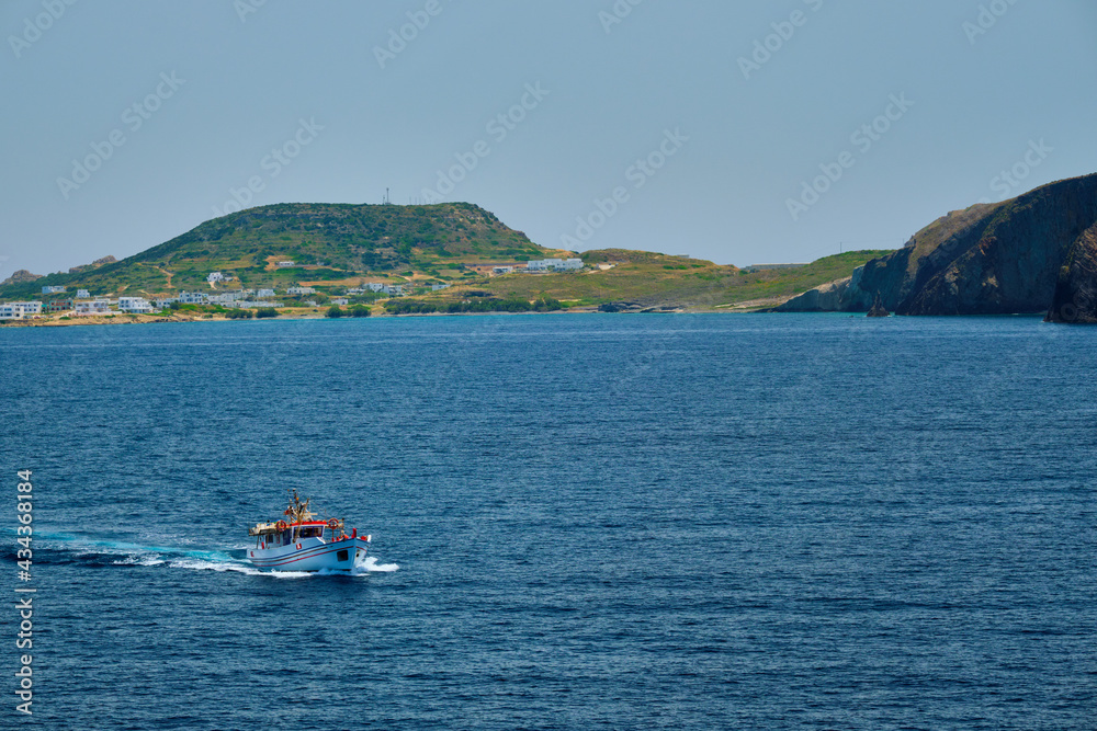 Greek fishing boat in Aegean sea near Milos island, Greece