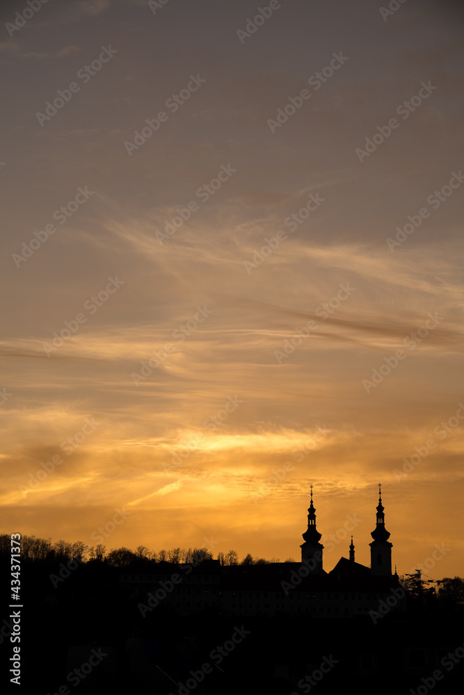 Silhouette of a monastery in Prague at sunset