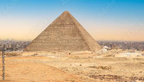 Ancient Pyramid Against blue Sky. Pyramid Chufu Cheops - known as the Great Pyramid. Cheops pyramid in Giza