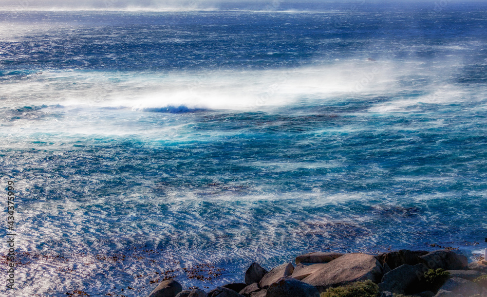 Obraz premium stormy sea with heavy wind gusts an flying water spray 