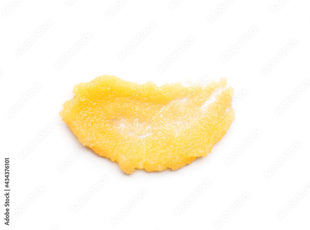 Smear of orange body scrub isolated on white, top view Smear of orange body scrub isolated on white, top view