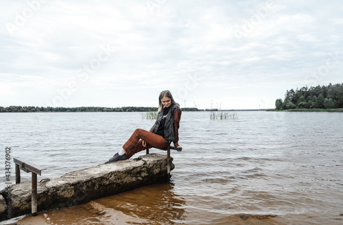 young woman near the water river horizon autumn water body of water leather j