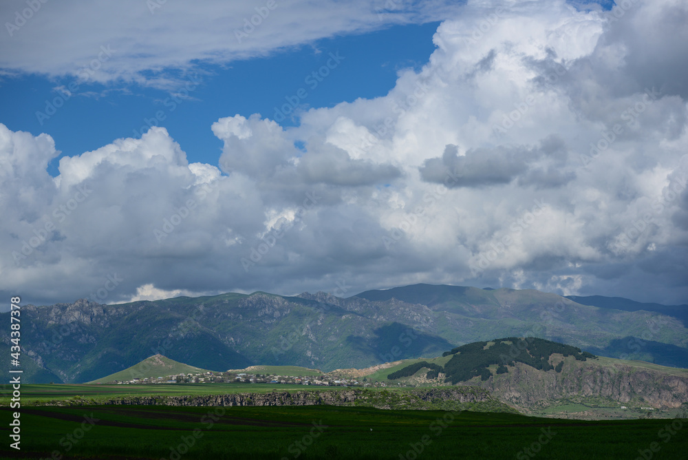 Spring landscape with settlement and field, Armenia