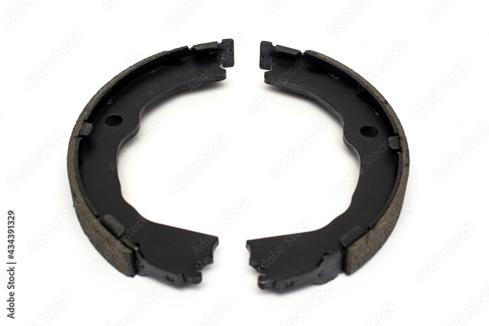 Obraz premium Handbrake pads car isolated on a white background. New spare parts.