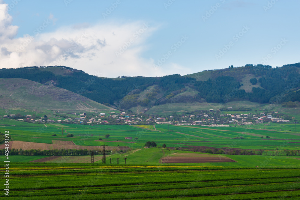Spring landscape with settlement and field, Armenia