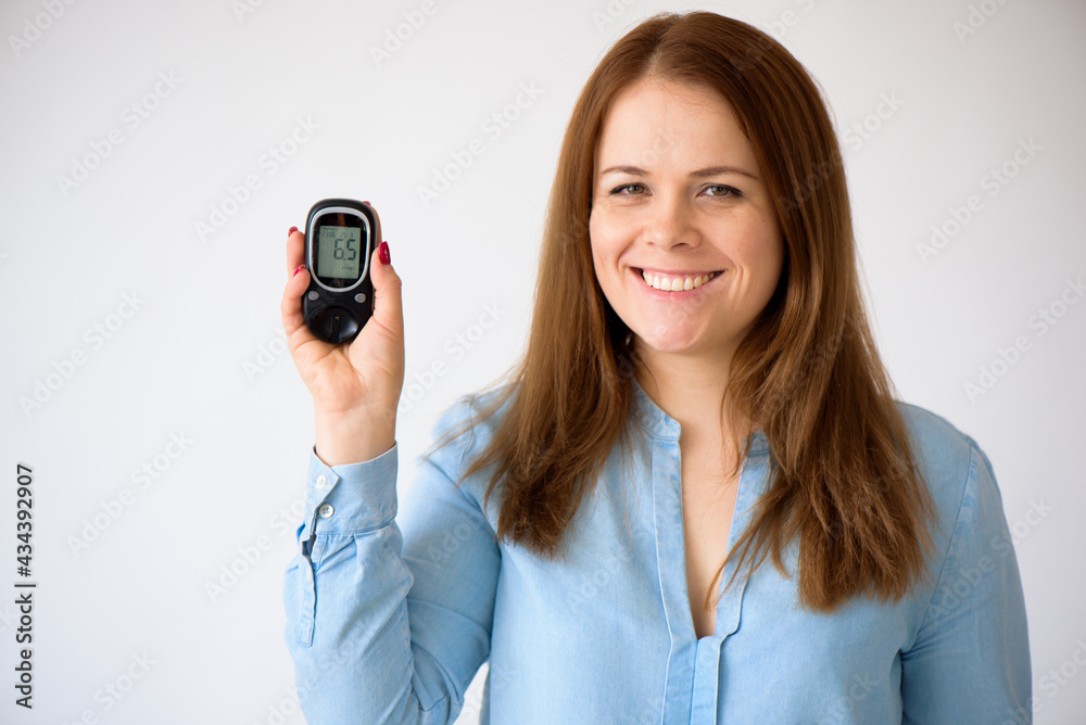 The diabetic measures the level of glucose in the blood. Diabetes concept. Diabetic supplies on a white background