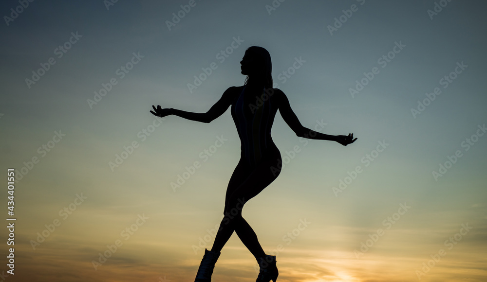 perfect female body. sensuality. female silhouette on sunset. woman dance in dark. perfect female body. sensuality. female silhouette on sunset. woman dance in dark.