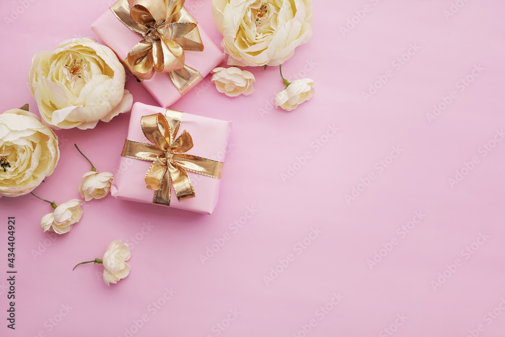 gift boxes with ribbon bow, flowers, pink background. copy space. mothers day, birthday, wedding, sale concept gift boxes with ribbon bow, flowers, pink background. copy space. mothers day, birthday, wedding, sale concept