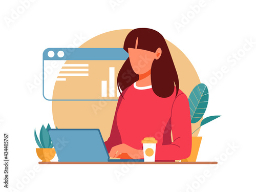 Beautiful cheerful young businesswoman working on laptop