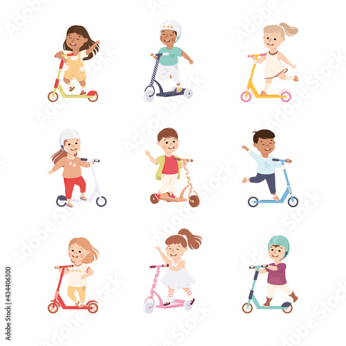Smiling Children Riding on Kick Scooter Pushing Off the Ground Vector Set