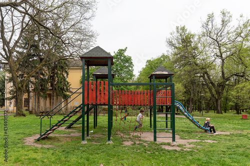 Coka, Serbia - May 01, 2021: Colorful kids outdoor playground. Children's playground in the town of Coka in Serbia.