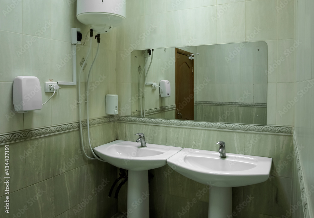 Fototapeta premium Two ceramic washbasins