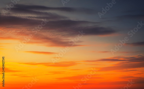 Beautiful fiery orange sunset sky as background