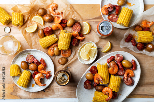 A low country homemade traditional  Southern U.S. Shrimp Boil with sausage, potato and corn photo